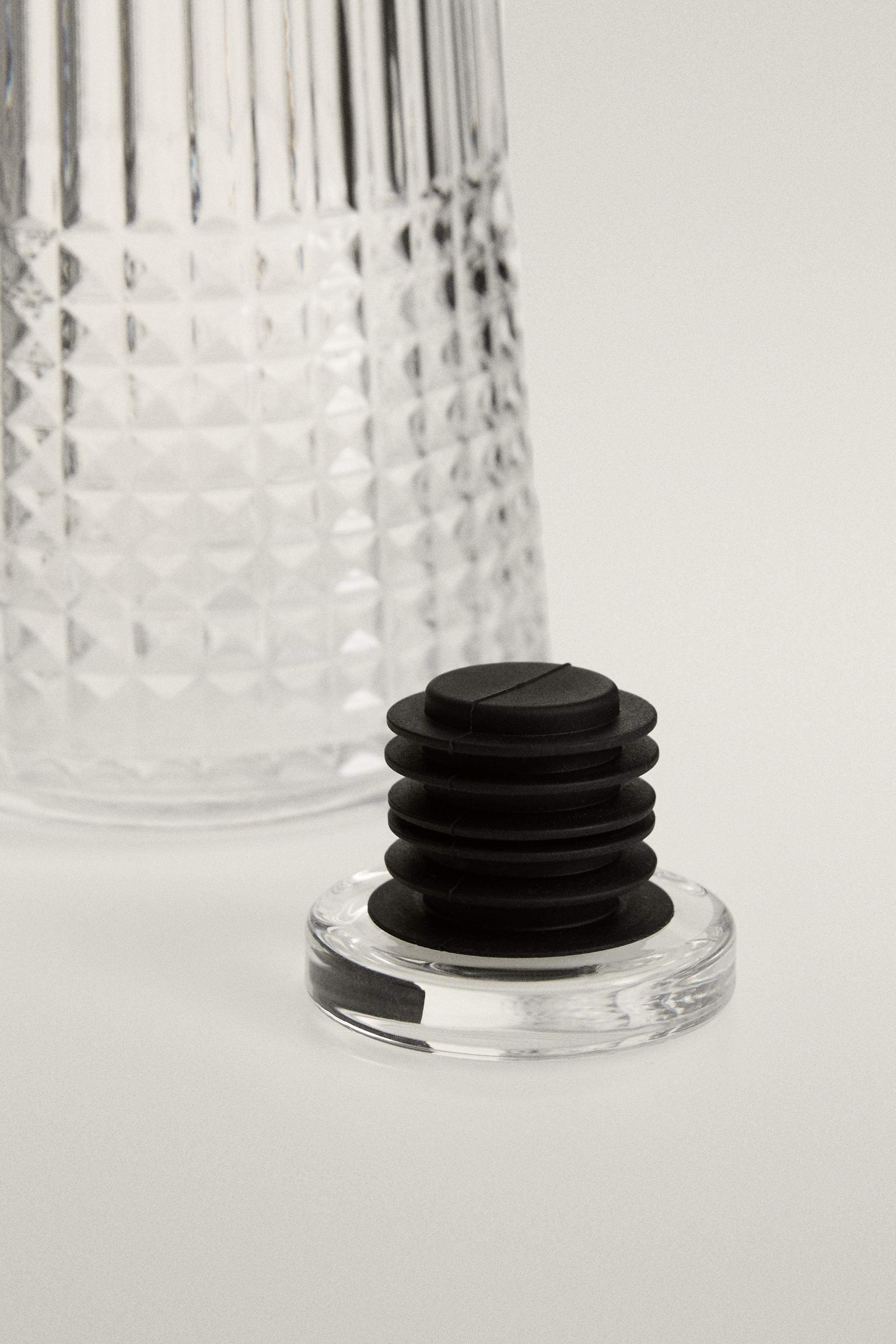 RAISED DESIGN GLASS BOTTLE